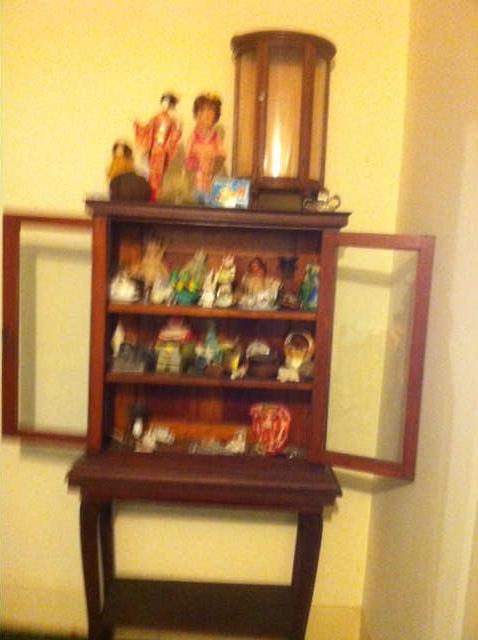 small curio full of vintage dolls AND MANY MORE STUFFED ANIMALS