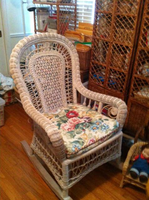 Probably Palacek wicker rocker, there is also a chld's wcker rocker, and several wicker tables and rattan shelves