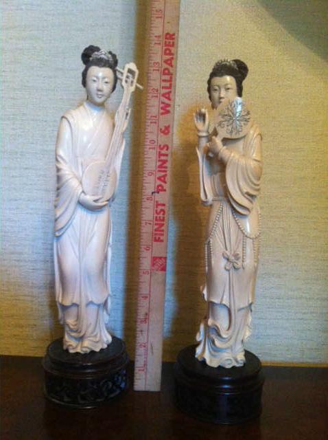A BEAUTIFUL PAIR OF CARVED IVORY MAIDENS