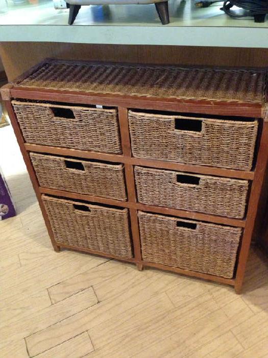 several sets of wicker drawers