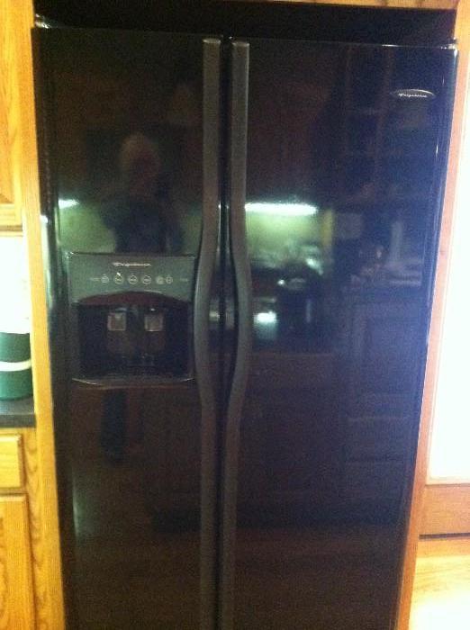 Frigidaire side-by-side fridge with ice & water in door