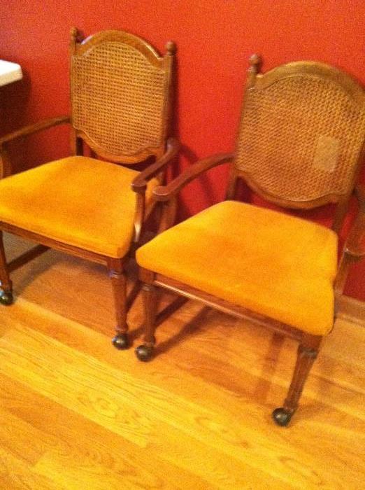 Hand caned dining chairs with castors