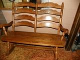 Great solid oak double rocker. Perfect for you and your honey!