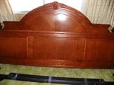 King headboard with rails from Ashley furniture. Less than 3 months old