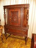 Lovely vintage cabinet. Lots of carving on this one!