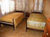 Pair of "1954" twin beds. Also have twin mattresses.