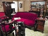 Red velvet parlor couch in perfect condition. Has two matching side chairs.
