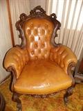 Beautifully carved leather chair.