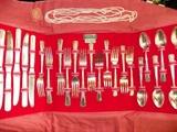 Really pretty pattern of silverplate. Service for 6. Also a lovely set of genuine pearls 100" long.
