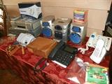 DVD & VHS combo, VHS player, lot of phones and new stereo in the box.
