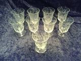 C25   American Brilliant Period Cut Crystal, Set of 9, 4 “tall Juice  Glasses Approx. 50 years old * 2 of the 9 glasses have 3 chips less than 1/64” on the  rim.