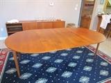 Danish Modern table,round with 2 large leaves.