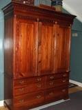very large wood entertainment armoire with drawers