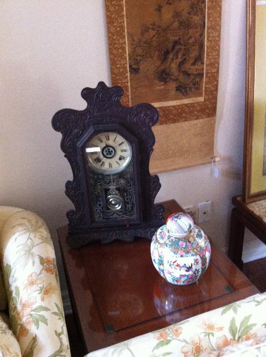              Mantel clock on 1 of 2 matching end tables