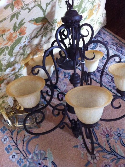    Small brass light fixture/large "Tuscon" chandelier