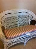                                White wicker settee