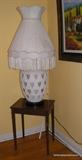 One of a matching pair pottery mid century lamps 40 inches tall