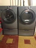 Newer side by side washer and dryer with under machine drawer storage.  Being sold only as a set