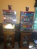 Another View, Slot Machines on top of glass front Cabinets