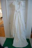 A brand new Saison Blanche Wedding Gown size 10.