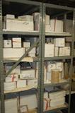 There are shelves filled with molds