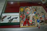 On the left hand side of this photograph is an Alaskan dog sled with dogs and driver