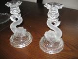 Figural dolphin candle sticks. Tiffin?