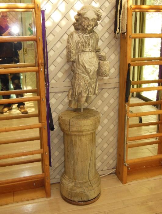 Antique Stone Maiden on an Antique wooden Column