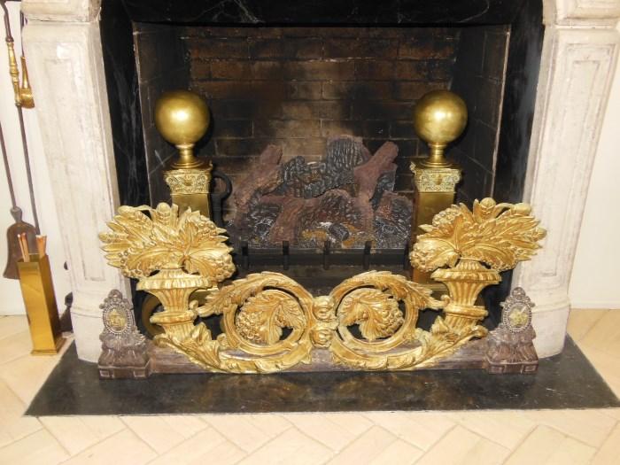 Flamboyant 1th. C. Gilt Fender and a pair of heavy Antique Brass Andirons
