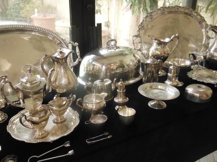 One of three tables covered with fine Silver & Sterling, including a large Antique Meat Dome.