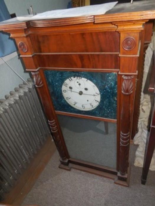 Asa Munger Clock( 1820) made this clock in Auburn, NY  It has carved columns, brass dials, 8 day strike and second  hand dials. Mr. Kopp states that it runs well.  The other Asa Munger is not pictured but has the same details.