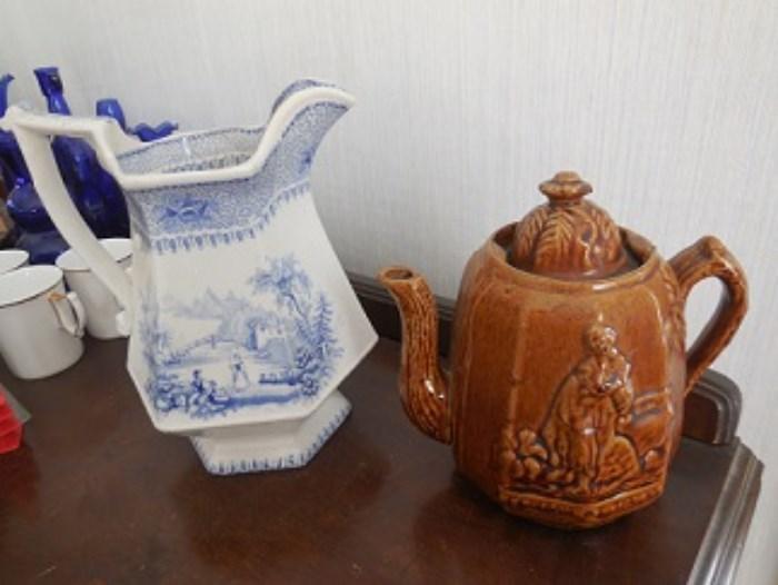 The Staffordshire pitcher is "Lucerne".   The note inside the "Rebecca at the well " teapot states it was made in Syracuse.  I am checking that.  