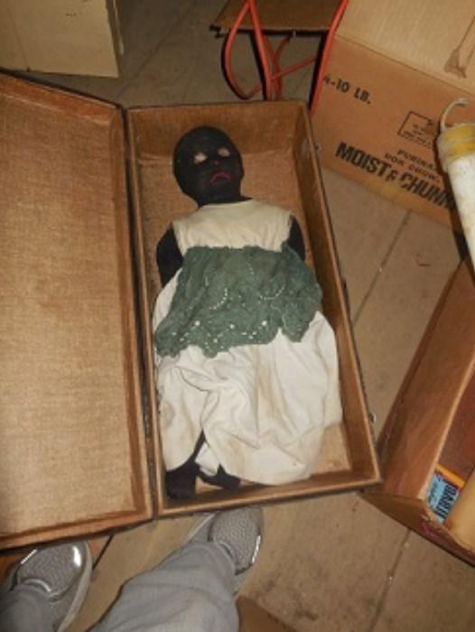 This doll is a 20 inch baby doll with knit over body.  She clothes are typical of early 1900's.