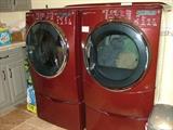 Kenmore Elite Front Loading Washer and Dryer, with the bases.  Lightly used as there were two laundry rooms in home.  