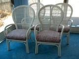 Four tall rattan chairs