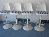 Four swivel bar stools