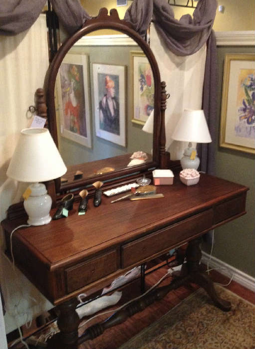 Antique vanity with swing mirror and twin glass lamps
