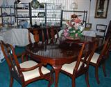 Formal dining set with 6 chairs and add'l leaf.