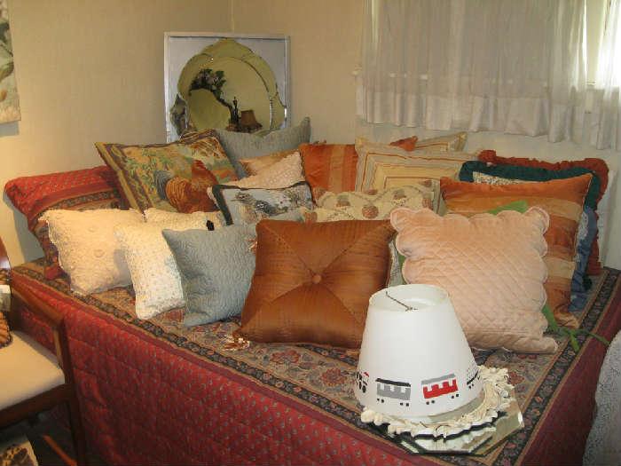 Many decorator pillows; train lampshade; scalloped mirror...