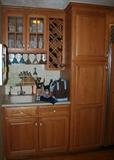 Oak cabinets with wine bottle rach and stemware rack. All cabinets will be auctioned!! (Silent Bids)