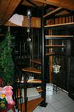 Beautiful wood and wrought iron spiral staircase!