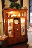 Beautiful lighted china cabinet. The drawers are lined. The plate rack is removable. The glass shelves are adjustable. It stands 76" high x 24" wide