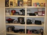 variety of kitchen appliances including krups expresso machine, kitchen aid mixer and kitchen aid blender