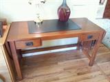This is a wonderful Mission Style Desk...with side flaps for a larger desk. Very nice. Bassett Manufacturer