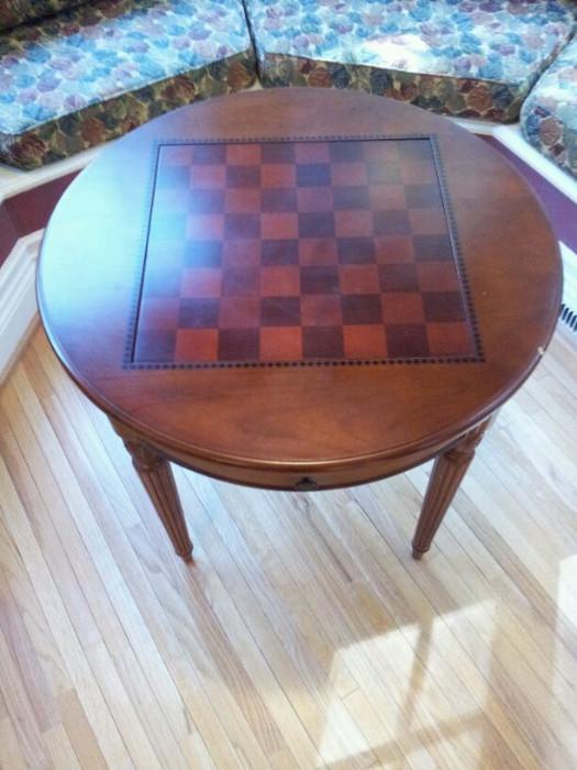 Game Table with drawers with game items. 