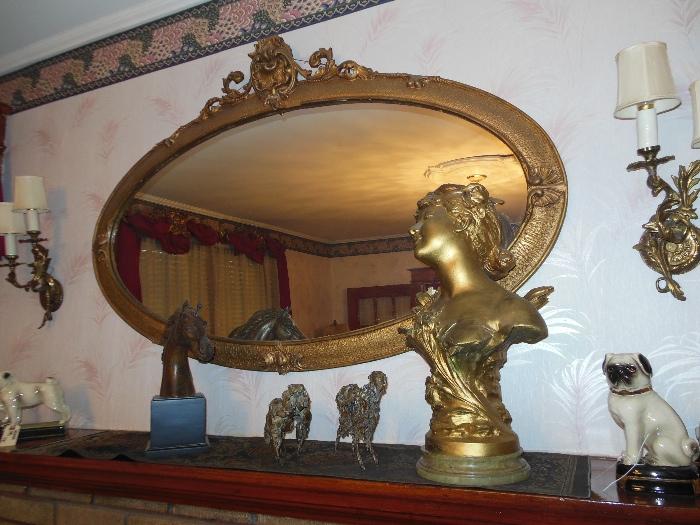 Beautiful and large gilt mantel mirror