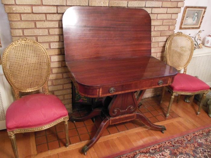 Antique game table with two silk-seat side chairs