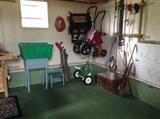 many tools in outdoor shed