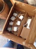 box of stoneware dishes from attic