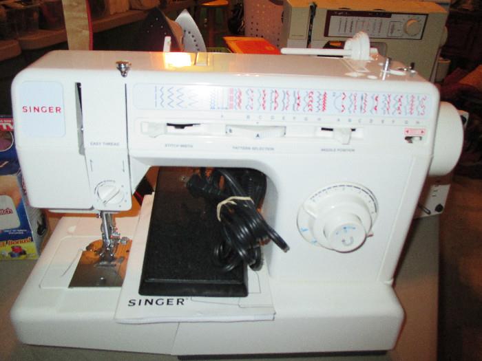 Singer Sewing Machine - there are 5 sewing machines